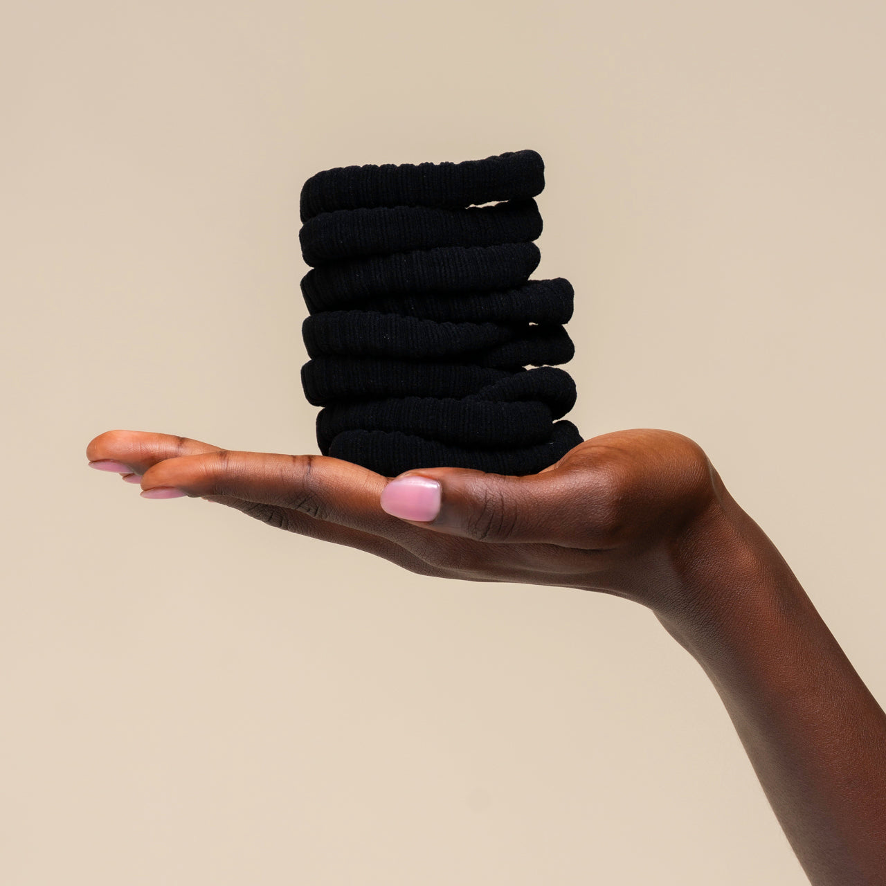 508757-RecycledFabricRibbedHairElastics-10pc-TrendHairAccessories-Black-Model-Hand-1280x1280px
