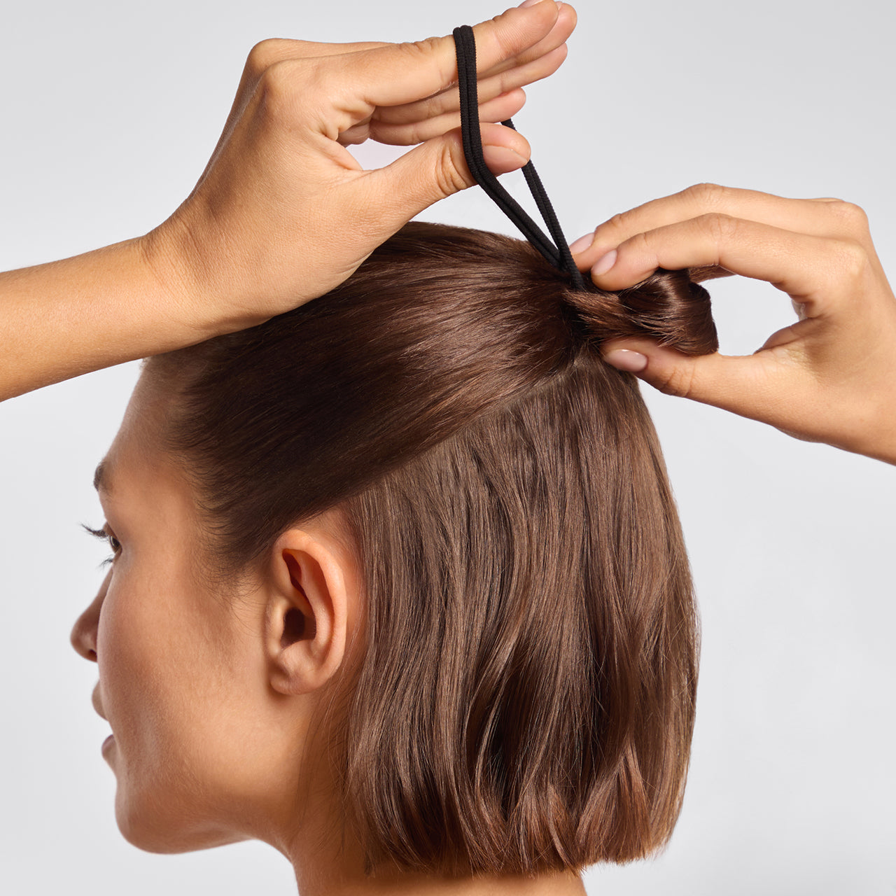 68899-SeamlessHairElastics-8pc-Hair-Black-Model-1280x1280px