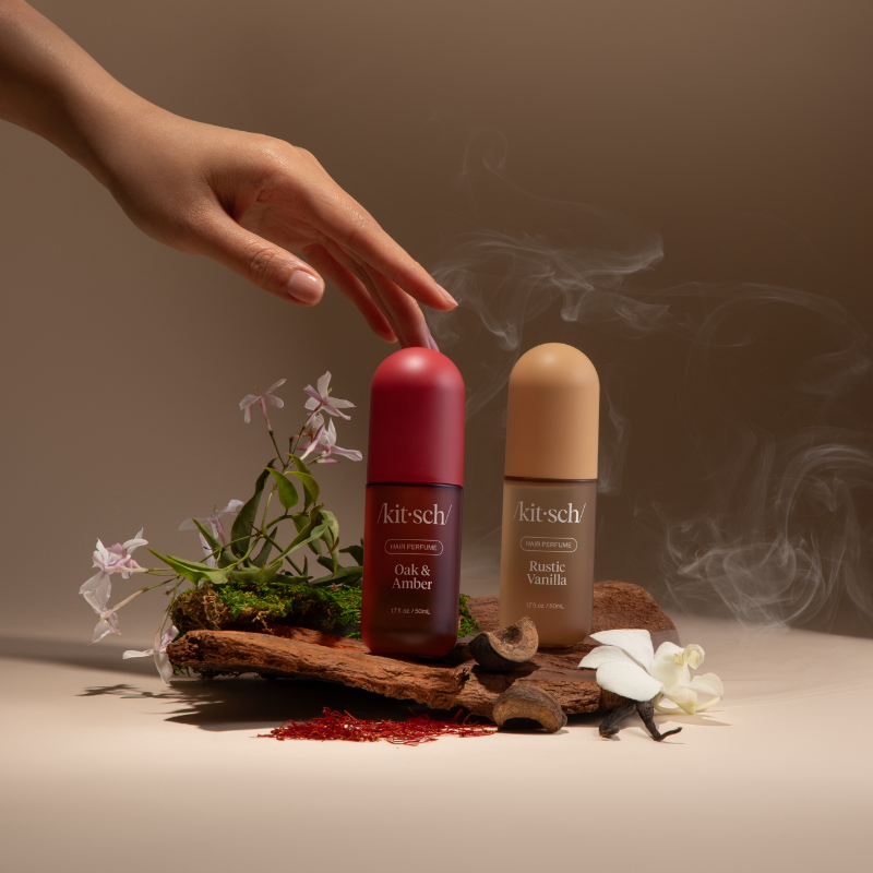 Headline_New_Hair_Perfumes_to_Enchant_Every_Moment_Text_Discover_two_unforgettable_scents_for_your_hair_ritual._Oak_Amber_a_woody_smoky_embrace_that_feels_like_a_golden_evening_by_the